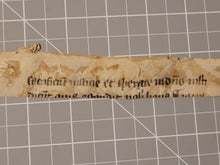 Load image into Gallery viewer, Leaf Fragment from a Medieval Text, 12th Century. Latin Manuscript on Parchment. 1.5 Lines of Carolingian-Gothic (Proto-Gothic) Script. Recovered from a Binding