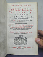 Load image into Gallery viewer, Hugonis Grotii De Jure Belli ac Pacis Libri Tres, 1689