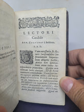 Load image into Gallery viewer, Institutiones D. Justiniani ss. Princ: typis variae, rubris nucleum exhibentibus: accesserunt ex Digestis tituli de verborum significatione et regul. Juris, 1676