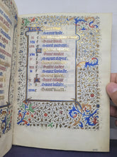 Load image into Gallery viewer, Book of Hours Calendar, Use of Paris, Circa 1450. Extravagantly Illuminated Manuscript on Vellum from France, By the Circle of the Master of Jean Rolin II, With Full Borders