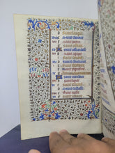 Load image into Gallery viewer, Book of Hours Calendar, Use of Paris, Circa 1450. Extravagantly Illuminated Manuscript on Vellum from France, By the Circle of the Master of Jean Rolin II, With Full Borders