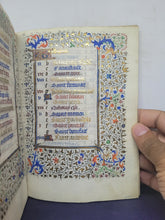 Load image into Gallery viewer, Book of Hours Calendar, Use of Paris, Circa 1450. Extravagantly Illuminated Manuscript on Vellum from France, By the Circle of the Master of Jean Rolin II, With Full Borders