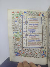 Load image into Gallery viewer, Book of Hours Calendar, Use of Paris, Circa 1450. Extravagantly Illuminated Manuscript on Vellum from France, By the Circle of the Master of Jean Rolin II, With Full Borders