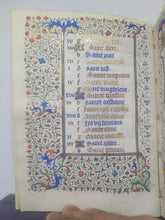 Load image into Gallery viewer, Book of Hours Calendar, Use of Paris, Circa 1450. Extravagantly Illuminated Manuscript on Vellum from France, By the Circle of the Master of Jean Rolin II, With Full Borders