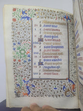Load image into Gallery viewer, Book of Hours Calendar, Use of Paris, Circa 1450. Extravagantly Illuminated Manuscript on Vellum from France, By the Circle of the Master of Jean Rolin II, With Full Borders