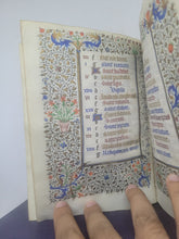Load image into Gallery viewer, Book of Hours Calendar, Use of Paris, Circa 1450. Extravagantly Illuminated Manuscript on Vellum from France, By the Circle of the Master of Jean Rolin II, With Full Borders