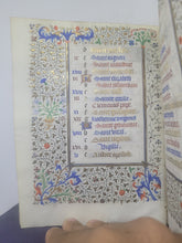 Load image into Gallery viewer, Book of Hours Calendar, Use of Paris, Circa 1450. Extravagantly Illuminated Manuscript on Vellum from France, By the Circle of the Master of Jean Rolin II, With Full Borders