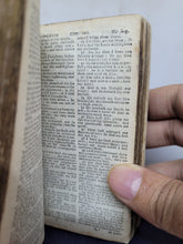 Load image into Gallery viewer, The Holy Bible Containing the Old Testament and The New; Bound With; The Whole Book of Psalms Collected into English Metre, 1658. Printed Waste Pastedowns.