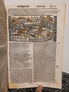 Vergilius com commentarijs. Opera Vergiliana: antea corrupta: con mendosa: nunc vero multorum exemplarium collatione in integrum restituta: docte: con familiariter exposita, 1519