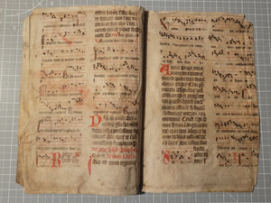 Two Leaf Bifolio from A Latin Missal, Germany, 14th Century. Manuscript on Parchment. 20 Lines of Gothic Script and Musical Notation. Recovered from a Binding