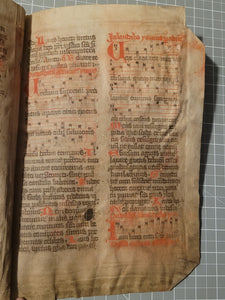 Two Leaf Bifolio from A Latin Missal, Germany, 14th Century. Manuscript on Parchment. 27 Lines of Gothic Script and Musical Notation. Recovered from a Binding