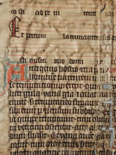 Load image into Gallery viewer, Leaf Fragment from a Latin Missal, Germany, 14th Century. Manuscript on Parchment. 20 Lines of Gothic Script. Musical Notation. Recovered from a Binding