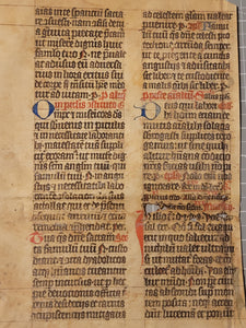 Leaf from a Latin Breviary or Missal, Germany, 14th Century. Recovered from a Binding. Manuscript on Parchment. 30 Lines of Gothic Script, and Ornate Initials