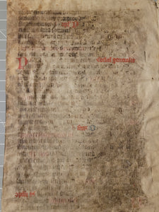 Leaf from a Latin Missal, Germany, 14th Century. Manuscript on Parchment. 33 Lines of Gothic Script, and Red and Blue Initials. Recovered from a Binding