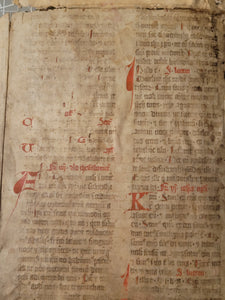 Two Leaf Bifolio from a Latin Missal, Germany, 14th Century. Manuscript on Parchment. 33 Lines of Gothic Script, 9 Large Red Initials. Recovered from a Binding