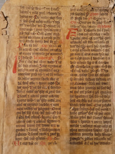 Two Leaf Bifolio from a Latin Missal, Germany, 14th Century. Manuscript on Parchment. 33 Lines of Gothic Script, 9 Large Red Initials. Recovered from a Binding