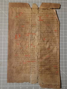 Leaf from a Latin Missal, Germany, 14th Century. Manuscript on Parchment. 33 Lines of Gothic Script, and Three Large Initials. Recovered from a Binding