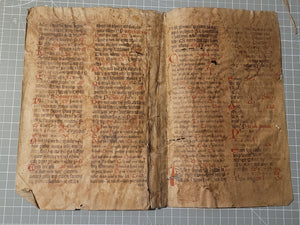 Two Leaf Bifolio from a Latin Missal or Breviary, Germany, 14th Century. 33 Lines of Gothic Script, Numerous Red Initials. Rescued Manuscript Waste