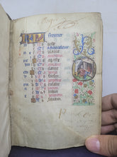 Load image into Gallery viewer, Book of Hours, Use of Paris, Circa 1460. Illuminated Manuscript on Parchment from France. With 9 Large Miniatures, 22 Calendar Miniatures, One Historiated Initial, 134 Border Illustrations. Illuminated Decorative Borders. Plus Side Wound of Christ