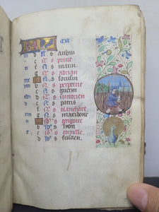 Book of Hours, Use of Paris, Circa 1460. Illuminated Manuscript on Parchment from France. With 9 Large Miniatures, 22 Calendar Miniatures, One Historiated Initial, 134 Border Illustrations. Illuminated Decorative Borders. Plus Side Wound of Christ