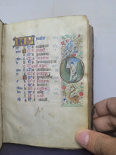 Load image into Gallery viewer, Book of Hours, Use of Paris, Circa 1460. Illuminated Manuscript on Parchment from France. With 9 Large Miniatures, 22 Calendar Miniatures, One Historiated Initial, 134 Border Illustrations. Illuminated Decorative Borders. Plus Side Wound of Christ