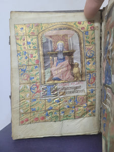 Book of Hours, Use of Paris, Circa 1460. Illuminated Manuscript on Parchment from France. With 9 Large Miniatures, 22 Calendar Miniatures, One Historiated Initial, 134 Border Illustrations. Illuminated Decorative Borders. Plus Side Wound of Christ