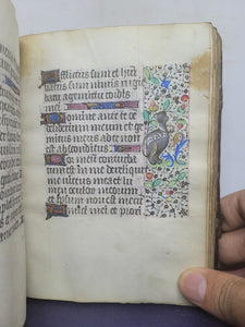 Book of Hours, Use of Paris, Circa 1460. Illuminated Manuscript on Parchment from France. With 9 Large Miniatures, 22 Calendar Miniatures, One Historiated Initial, 134 Border Illustrations. Illuminated Decorative Borders. Plus Side Wound of Christ