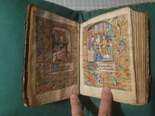 Load image into Gallery viewer, Book of Hours, Use of Paris, Circa 1460. Illuminated Manuscript on Parchment from France. With 9 Large Miniatures, 22 Calendar Miniatures, One Historiated Initial, 134 Border Illustrations. Illuminated Decorative Borders. Plus Side Wound of Christ