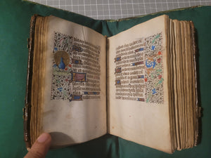 Book of Hours, Use of Paris, Circa 1460. Illuminated Manuscript on Parchment from France. With 9 Large Miniatures, 22 Calendar Miniatures, One Historiated Initial, 134 Border Illustrations. Illuminated Decorative Borders. Plus Side Wound of Christ