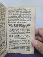 Load image into Gallery viewer, Des Barmhertzigen Samariters Dritter Theil, In einen approbirten Haus-Artzt, oder compendiösen Hausapothecken vorgestellt, 1720(?). Bound in a Late 12th Century Biblical Manuscript, Containing Matthew 7-15