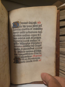 Book of Hours, Circa 1450. Use of Paris, France. Illuminated Manuscript on Vellum, 11 Damaged Full-Page Miniatures with Full Borders, and Two Historiated Initials