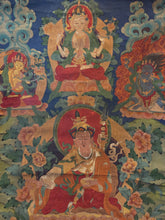 Load image into Gallery viewer, A Thangka of the Manifestation of Padmasambhava, or Guru Rinponche, Accompanied by Several Heavenly and Wrathful Deities, Circa 1880-1920. A Tibetan Painting, Colored Vibrantly