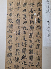 Load image into Gallery viewer, Mokuhan he, or Kyōgire (Ancient Manuscript Sutra Fragments), Circa 900-1400. A Surprisingly Varied Collection of 15 Sutra Leaves, Including Illuminated, Indigo Dyed Examples, and a Piece Purportedly Written in Blood and Ink
