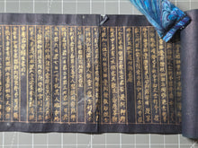 Load image into Gallery viewer, Hotoke Shuo Amida Kei (The Amitabha Sutra), Circa 794-1185. An Extraordinarily Rare, Miniature Illuminated Manuscript of the Blissful Land, with the Amida Triad in Seed Syllable Form