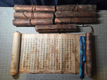 Load image into Gallery viewer, Myoho Renge Kyo, not after 1670. A Rare Woodblock Printed Set of the Lotus Sutra, Circa 1550-1670. Eight Scrolls Beautifully Printed on Mulberry Paper, in Eight Volumes