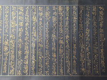 Load image into Gallery viewer, Myohorengekyo (The Lotus Sutra), Circa 1600-1650. An Illuminated, Albeit Incomplete Manuscript Scroll of the Lotus Sutra, on Indigo Dyed Paper