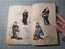 Load image into Gallery viewer, An Oshi-e Manuscript of Ukiyo-E Figures, Circa 1800-1860. A Marvelous Composite Manuscript, with Clothing and Vestments Made Using Kimono Fragments and Brocade. 88 Fabric Decorated Figures