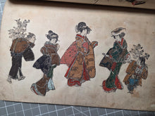 Load image into Gallery viewer, An Oshi-e Manuscript of Ukiyo-E Figures, Circa 1800-1860. A Marvelous Composite Manuscript, with Clothing and Vestments Made Using Kimono Fragments and Brocade. 88 Fabric Decorated Figures