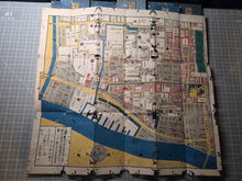 Load image into Gallery viewer, Edo Kiriezu (Cut-in-Pieces Map of Edo), 1852-1864. A Near Complete Chart of Tokyo, In Thirty Hand Colored Woodblock Print Maps. The Owariya Ban Kiri-e Zu