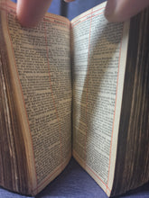 Load image into Gallery viewer, The Holy Bible containing the Old Testament and the New; Bound With; The Whole Book of Psalms Collected into English Meter, 1676/1677. Contemporary Binding with a Curious Spine and Silver Clasp,  and Early Women Ownership Inscriptions