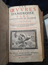 Load image into Gallery viewer, Les Oeuvres d'Ambroise Pare, 1664. The 12th Edition of Pare’s Collected Works, with Hundreds of Woodcuts Showing Monstrous Creatures, Anatomical Views, Surgical Procedures, Tools, Deformities, and Much More