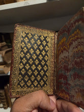 Load image into Gallery viewer, Prieres Pour la Confession et Pour la Communion, Circa 1675-1625. A Beautiful Manuscript of Confession and Communion, with Six Grand Initials and Headers, Several Ownership Inscriptions and Notes. French Illuminated Manuscript on Parchment