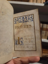 Load image into Gallery viewer, Prieres Pour la Confession et Pour la Communion, Circa 1675-1625. A Beautiful Manuscript of Confession and Communion, with Six Grand Initials and Headers, Several Ownership Inscriptions and Notes. French Illuminated Manuscript on Parchment