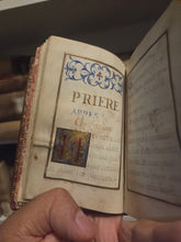Load image into Gallery viewer, Prieres Pour la Confession et Pour la Communion, Circa 1675-1625. A Beautiful Manuscript of Confession and Communion, with Six Grand Initials and Headers, Several Ownership Inscriptions and Notes. French Illuminated Manuscript on Parchment