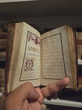 Load image into Gallery viewer, Prieres Pour la Confession et Pour la Communion, Circa 1675-1625. A Beautiful Manuscript of Confession and Communion, with Six Grand Initials and Headers, Several Ownership Inscriptions and Notes. French Illuminated Manuscript on Parchment